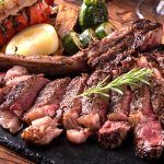 Tomahawk gallego asado a la brasa.